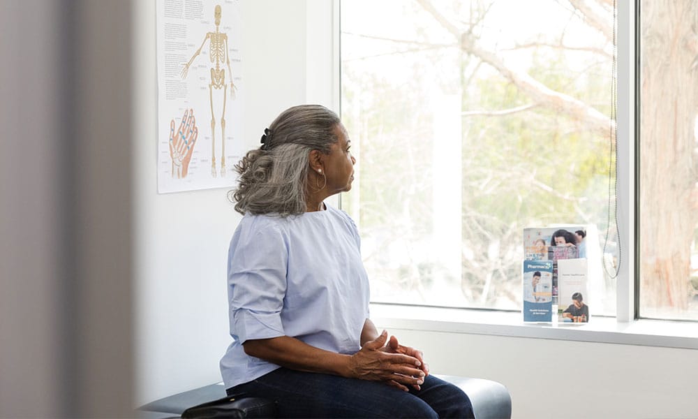 woman visiting the doctor after her catastrophic injury in Houston