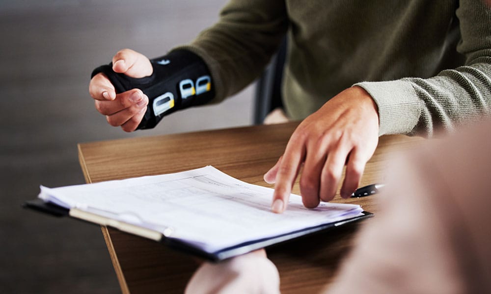 man meeting with his catastrophic injury lawyer in Houston, TX