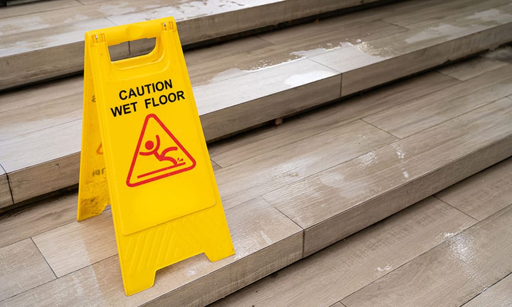 caution wet floor sign in Houston, TX