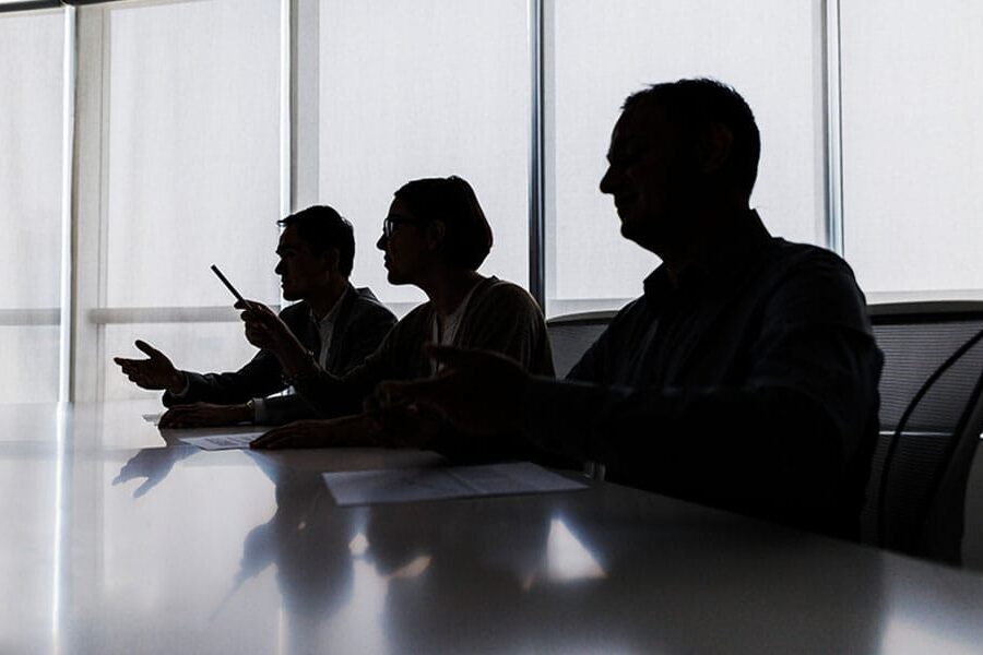 commercial litigation lawyers at a conference table in Houston, TX
