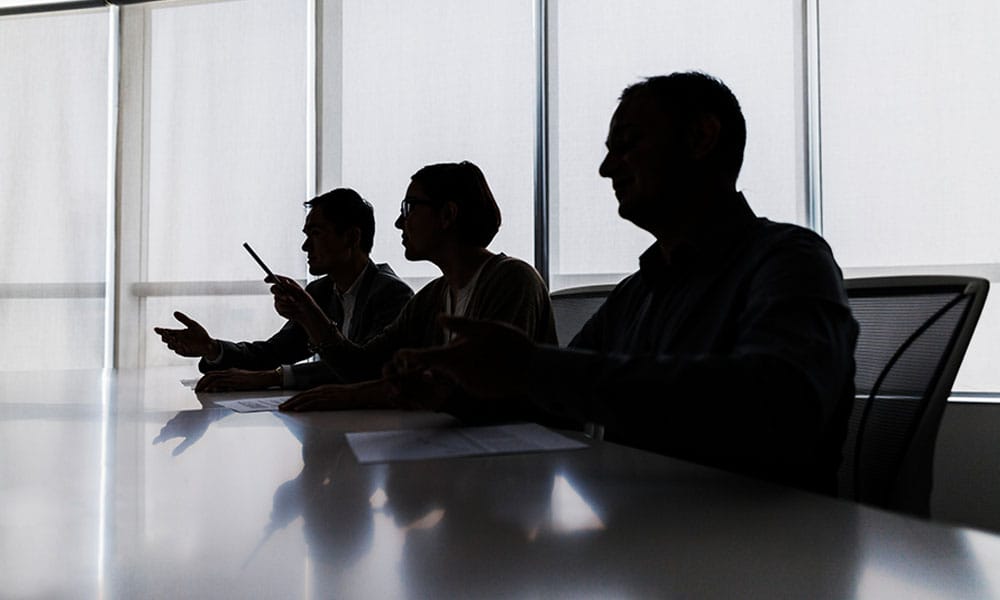 commercial litigation lawyers at a conference table in Houston, TX